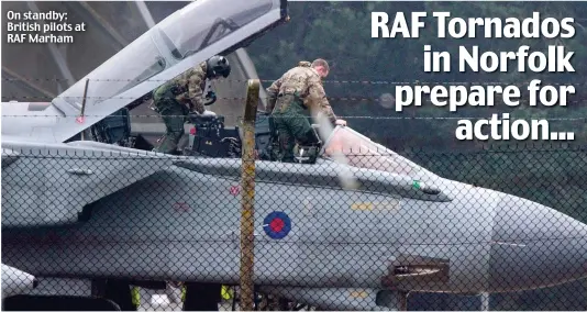 ??  ?? On standby: British pilots at RAF Marham