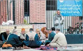  ?? MOHAMED EL-SHAHED/GETTY-AFP ?? Relatives of victims wait Saturday outside a hospital in the port city of Ismailia. Friday’s assault was Egypt’s deadliest attack by Islamic extremists in the country’s modern history.