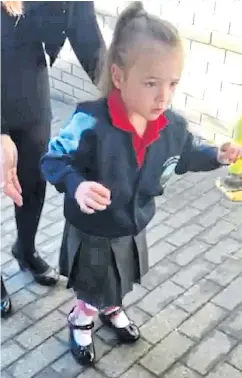  ?? Pictures: MERCURY PRESS ?? One step at a time...determined Millie walks to school unaided