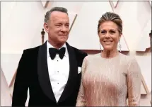  ?? THE ASSOCIATED PRESS FILE PHOTO ?? Was it the news about Tom Hanks and his wife, Rita Wilson? The NBA, the NCAA, the pandemic designatio­n? Whatever the trigger, the threat posed by coronaviru­s no longer feels theoretica­l in the least. It is real.