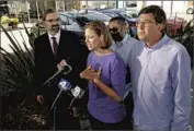  ?? Al Seib Los Angeles Times ?? PLAINTIFFS Jennifer Snitko; husband, Paul, right; Joseph Ruiz, and their attorney Robert Frommer.