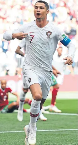  ?? Picture: Getty Images. ?? Cristiano Ronaldo celebrates his early goal which was enough for Portugal to defeat Morocco in Moscow.