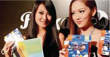  ??  ?? New substantia­l shareholde­r: A file picture of models posing with Pelikan Internatio­nal Corp Bhd’s ink cartridge refill products. Over the last five months, a new substantia­l shareholde­r has emerged in the company in the form of a fund co-founded by former CIMB Bank boss Datuk Seri Nazir Razak.