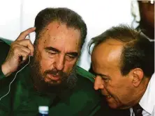  ?? Jose Goitia / Associated Press 2001 ?? Fidel Castro and Ricardo Alarcon, then-president of the Cuban National Assembly, attend a conference in Havana.