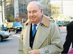  ?? Louis Lanzano Associated Press ?? ART AUCTION CASE Taubman goes to court during his 2001 price-fixing trial. He spent nearly a year in prison and paid about $7.5 million for his actions while Sotheby’s chairman.