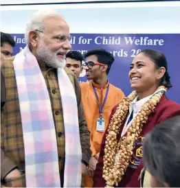  ?? — PTI ?? Prime Minister Narendra Modi interacts with winners of National Bravery Awards in New Delhi on Wednesday.