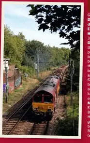  ??  ?? DB’S Lickey banker 66057 - note the additional headlamp - climbs towards Hampstead Heath summit on September 27 2013 with a Marks Tey-brentford Town freight. These ‘66s’ are often used away from the Lickey. ANTONY GUPPY