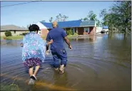  ?? GERALD HERBERT — THE ASSOCIATED PRESS ?? Lake Charles, La., on Oct. 10, 2020, after Hurricane Delta moved through the previous day. According to a study, climate change made the record-smashing deadly 2020 Atlantic hurricane season wetter.