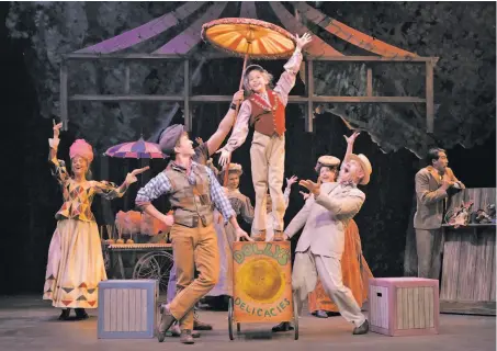  ?? Kevin Berne / TheatreWor­ks ?? Jesse (Eddie Grey, foreground left), Winnie (Natalie Schroeder) and a fair-goer (Jonathan Rhys Williams) frolic at the fair in TheatreWor­ks’ “Tuck Everlastin­g” at Lucie Stern Theatre, based on the popular young-adult novel.