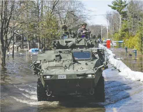  ?? JUSTIN TANG / THE CANADIAN PRESS FILES ?? A proposal to send Canadian LAV3S was spurned on the basis that the Ukrainians don’t have the parts or the training to operate them, John Ivison writes.