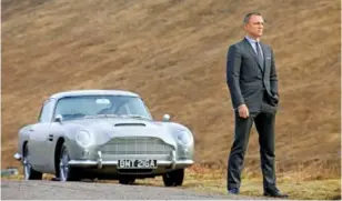  ??  ?? Left: The DB5 from Goldfinger made a re-appearance in 2015 in Spectre, with Daniel Craig.