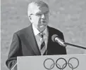  ?? PETROS GIANNAKOUR­IS/AP ?? IOC President Thomas Bach speaks before the lighting of the Olympic on Oct. 18.