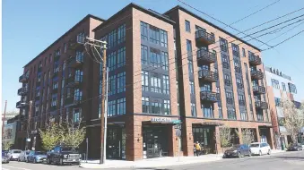  ??  ?? Mid-rise buildings, with a mix of retail and restaurant­s at street level, create an attractive pedestrian environmen­t.