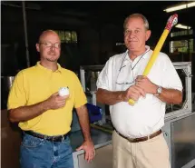  ?? Bob Child/Associated Press file photo ?? David J. Mullany, left, and his father, David A. Mullany, pose at the Wiffle Ball factory in Shelton in 2003.