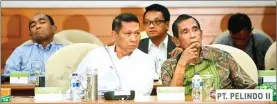  ?? HENDRA EKA/JAWA POS ?? SERIUS: Dirut Pelindo II R.J. Lino (kiri) dan Komisaris Tumpak Hatorangan dalam rapat kemarin.
password.