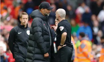  ?? Photograph: Carl Recine/Reuters ?? Jürgen Klopp and referee Paul Tierney exchange views during Liverpool’s Premier League match against Tottenham Hotspur on 30 April.