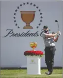  ?? The Associated Press ?? Adam Hadwin of Canada hits from the first tee during the four-ball matches at the Presidents Cup on Friday.