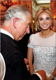  ??  ?? WELL-CONNECTED: Corinna with Juan Carlos in 2006, left, and with Prince Charles at Buckingham Palace in 2014, above