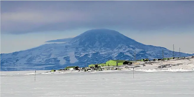  ?? PHOTOS: IAIN McGREGOR/STUFF ?? Mt Discovery looms over Scott Base.