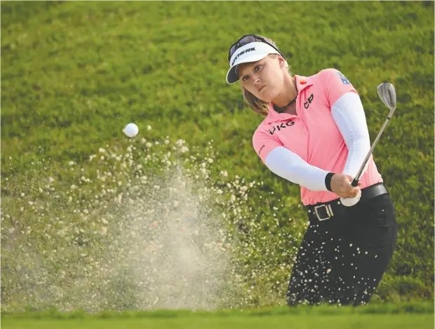  ?? STUART FRANKLIN / GETTY IMAGES ?? Brooke Henderson, who won her only major title at the Women’s PGA Championsh­ip in 2016, has taken a three-shot lead after Friday’s second round of The Amundi Evian Championsh­ip in Evian-les-bains, France.