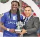  ??  ?? Gomis (left) with the MVP award