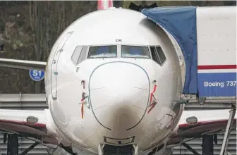  ?? JASON REDMOND/AFP VIA GETTY IMAGES, FILE ?? A 737 Max at the Boeing factory in Renton, Washington.