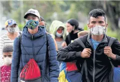  ?? REUTERS ?? Venezuelan migrants walk towards the border between Venezuela and Colombia during the Covid-19 outbreak in San Cristobal, Venezuela.