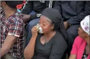  ?? (File Photo/AP) ?? Family members mourn victims of attacks blamed on Fulani herdsmen Jan. 11, 2018, during a mass funeral in Makurdi, Nigeria. Mourners gathered in Nigeria for a mass funeral for more than 70 people killed in a series of attacks blamed on Fulani herdsmen.