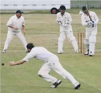  ??  ?? Murton bowler Sam Sanderson tries in vain to catch out Littletown batsman Matt Dench. Pics by Tim Richardson