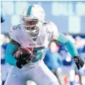  ?? ELSA/GETTY ?? The Dolphins restructur­ed receiver Albert Wilson’s contract with the hope he can regain the form he had in 2018, when he led the NFL in yards after catch.