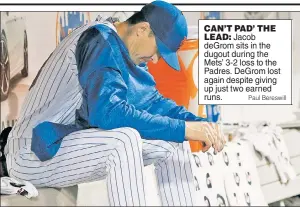  ?? Paul Bereswill ?? CAN’T PAD’ THE
LEAD: Jacob deGrom sits in the dugout during the Mets’ 3-2 loss to the Padres. DeGrom lost again despite giving up just two earned runs.