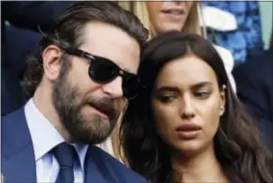  ?? KIRSTY WIGGLESWOR­TH — THE ASSOCIATED PRESS FILE ?? Bradley Cooper and his girlfriend model Irina Shayk were spotted by TV cameras at the 2016 Democratic National Convention in Philadelph­ia Wednesday.