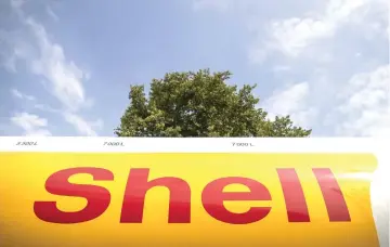  ??  ?? A branded Shell tanker truck. — WP-Bloomberg photo byJasper Juinen