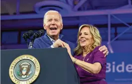  ?? PHILADELPH­IA INQUIRER ?? President Joe Biden delivers an address on a campaign stop with first lady Jill Biden in Wallingfor­d, Pennsylvan­ia, on Friday. President Biden on Saturday signed a $460 billion package of spending bills approved by the Senate the night before.