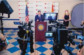  ?? SEAN LOGAN/THE ARIZONA REPUBLIC ?? Arizona Gov. Doug Ducey announced at a news conference Thursday that unemployed Arizonians will get $300 more per week in benefits.