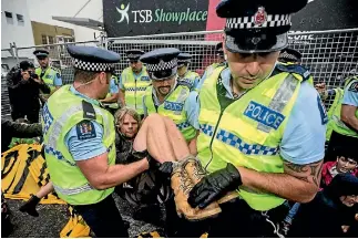  ?? PHOTO: ANDY JACKSON/FAIRFAX NZ ?? Police had to physically remove protesters, who wanted to delay the New Zealand Petroleum Conference 2017.