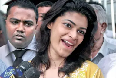  ??  ?? Hirunika Premachand­ra seen outside the Colombo Magistrate’s Court yesterday. Pic by Kushan Pathiraja