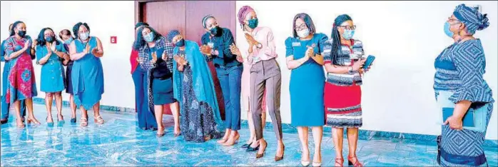  ??  ?? Women at the office of the Vice President welcome the Director General, World Trade Organisati­on, Dr. Ngozi Okonjo- Iweala, during her meeting with Prof. Yemi Osinbajo at the Presidenti­al Villa in Abuja… yesterday.