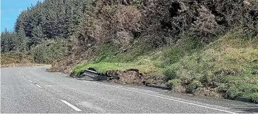  ?? ALLAN HOULT ?? Contractor­s are working to repair state highways across the top of the south after massive flood and slip damage.