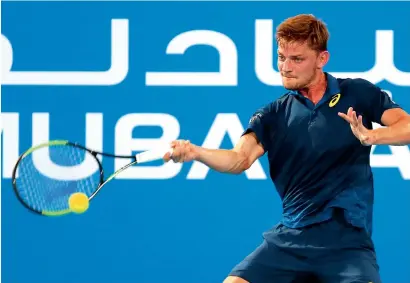  ?? Photo by Ryan Lim ?? David Goffin plays a shot against Jo-Wilfred Tsonga during the first day of Mubadala World Tennis Championsh­ip in Abu Dhabi on Thursday. —