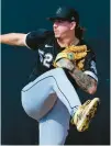  ?? MATT YORK/AP ?? White Sox pitcher Mike Clevinger throws during a spring training practice Feb. 18in Glendale, Ariz.