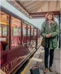  ?? RER ?? Left: Georgina Townsend, daughter of the late Mrs Ruth Adorian, who was a long-serving director of Lake District Estates, officially launches director’s saloon Ruth into service on May 16. The last of the three new coaches to be delivered, it is designed to deliver special first class experience­s for guests, with traditiona­l cream teas or Lakeland hampers. It features covered outdoor balcony seating, USB speakers, fold-down tables for wheelchair access, and two private compartmen­ts with an engraved glass sliding panel, allowing both sides to become one.