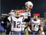  ?? KEITH SRAKOCIC — THE ASSOCIATED PRESS FILE ?? Patriots quarterbac­k Tom Brady celebrates as he leaves field after last week’s victory over Steelers.