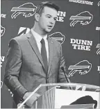  ?? JOHN WAWROW THE ASSOCIATED PRESS ?? Quarterbac­k A.J. McCarron speaks to the media after his arrival at Buffalo Bills headquarte­rs this week.