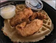  ?? (Arkansas Democrat-Gazette/Eric E. Harrison) ?? The Chicken & Waffle from Slim Chickens lacked oomph, even at a discount.