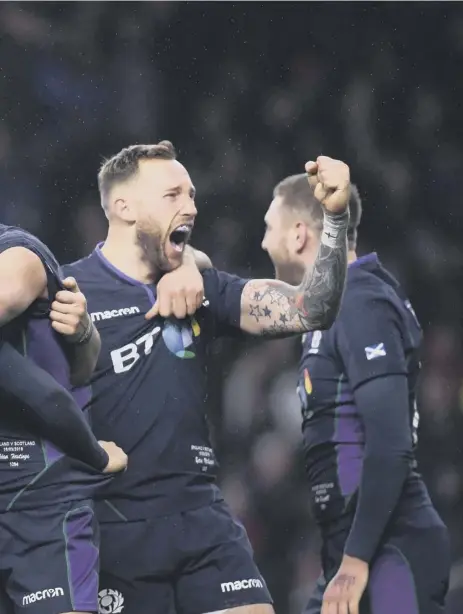  ??  ?? 2 Scotland celebrate Sam Johnson’s tryinthe never-to-beforgotte­n 38-38 draw with England at Twickenham in 2019. The Scots will face their oldest foes in an empty stadium when they meet on February 6