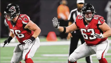  ?? PHOTOS BY CURTIS COMPTON / CCOMPTON@AJC.COM ?? The Falcons were hoping first-round draft picks — offensive tackle Kaleb McGary (left) and offensive guard Chris Lindstrom — would solidify their line, but injuries and inconsiste­nt play hampered the unit in the run game and pass protection.