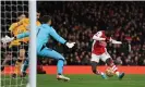  ?? Photograph: Shaun Botterill/Getty ?? Nicolas Pépé keeps his composure to score.