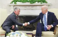  ?? (Jonathan Ernst/Reuters). ?? US PRESIDENT Joe Biden meets with Jordan’s King Abdullah II at the White House yesterday.