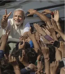  ?? GETTY IMAGES FILE PHOTO ?? Bharatiya Janata Party leader Narendra Modi greets supporters in April.